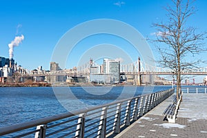 Waterfront along the East River in Long Island City Queens New York looking out towards the Queensboro Bridge