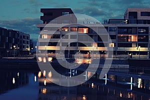 Waterfront apartments at night