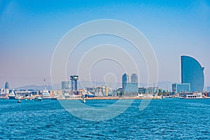 Waterfront of Barcelona dominated by Hotel W designed by Ricardo Bofill, Spain photo