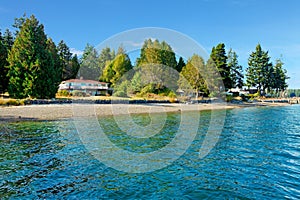 Waterfront house in Northwest with water and fall beach.