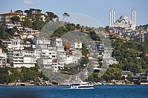 Waterfront houses and Camlica mosque. Bosphorus strait near Istanbul. Turkey