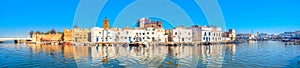 Waterfront panorama with picturesque houses and wall of kasbah at old port in Bizerte. Tunisia