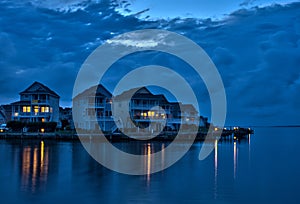 Waterfront vacation homes at at dusk