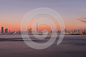 Waterfront view of Burj Khalifa, World Tallest Tower. A view from Dubai Creek Harbour, Re