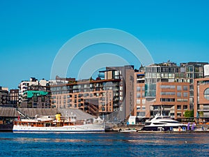 Waterfront view on Oslo city harbor in a sunny summer day. Norway