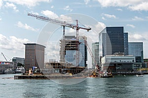 Waterfront view skyline Boston MA, USA new skyscraper construction near waterfront bay