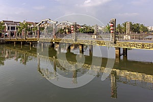 Waterfront view of Thu Bon River, at Hoi An ancient town historic district, UNESCO world heritage site. Vietnam.