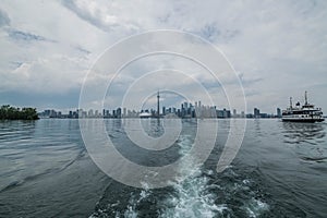 Waterfront view of Toronto City Skyscrapers along with CN Tower and Rogers Centre, Scarborough districts in summer, a view from To