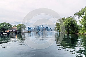 Waterfront view of Toronto City Skyscrapers along with CN Tower and Rogers Centre, Scarborough districts in summer, a view from To