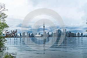 Waterfront view of Toronto City Skyscrapers along with CN Tower and Rogers Centre, Scarborough districts in summer, a view from To