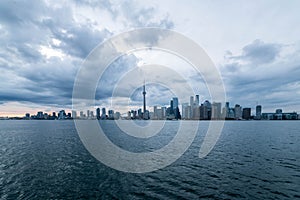 Waterfront view of Toronto City Skyscrapers along with CN Tower and Rogers Centre, Scarborough districts in summer, a view from To