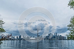 Waterfront view of Toronto City Skyscrapers along with CN Tower and Rogers Centre, Scarborough districts in summer, a view from To