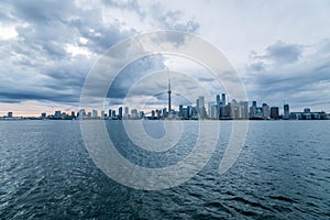 Waterfront view of Toronto City Skyscrapers along with CN Tower and Rogers Centre, Scarborough districts in summer, a view from To