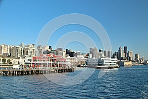 Waterfront views of Pier 70 in Seattle, Washington with the skyline in the background