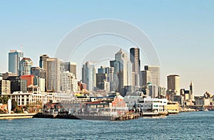 Waterfront views of Pier 70 in Seattle, Washington with the skyline in the background