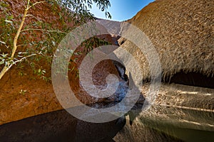 Waterhole by Uluru / Ayers Rock in the southern part of the Northern Territory photo