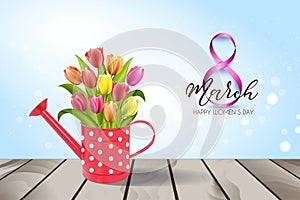 Watering can with bouquet of tulips