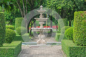 Watering fountain in public park.