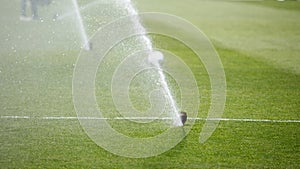 Watering the lawn water grass football field