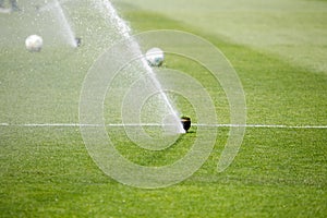 Watering the lawn water grass football field