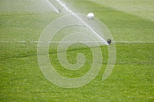 Watering the lawn water grass football field