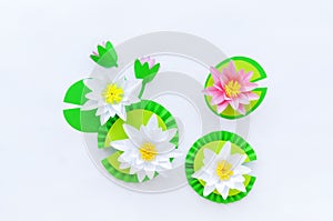 Waterlily flower made of paper. white background. Origami hobby. Gentle petal
