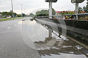 Waterlogged on road due to clogged drainage system