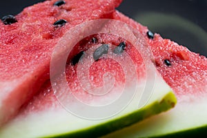 Watermelon on black plate