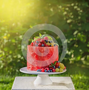 Watermelon cake with fresh summer berries,