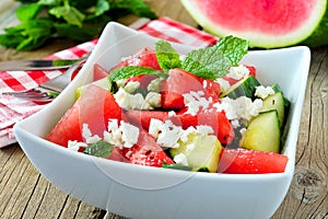 Watermelon, cucumber and feta cheese salad, close up