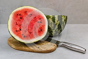 Fresh watermelon cut with knife. Watermelon cut half in two pieces