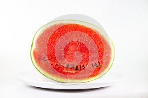 Watermelon on dish isolate on white background