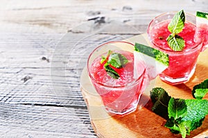 Watermelon drink in glasses with slices of watermelon