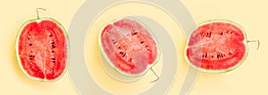 Watermelon fruit sliced half isolated on yellow background