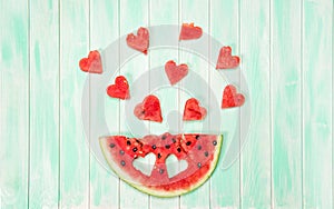 Watermelon hearts wooden background Creative summer food