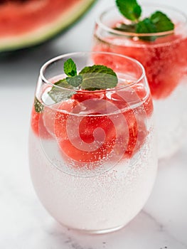 Watermelon ice with sparkling water in glasses