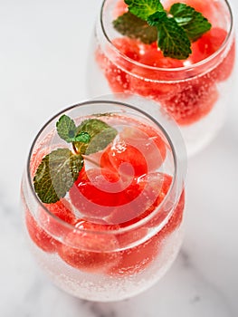 Watermelon ice with sparkling water in glasses