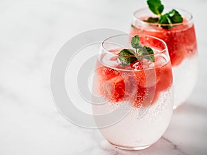 Watermelon ice with sparkling water in glasses