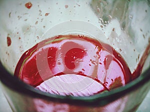 Watermelon juice ,  red juice , red colour drink, juice in glass , view inside glass , half filled juice glass