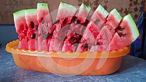 Watermelon in the kithen table photo
