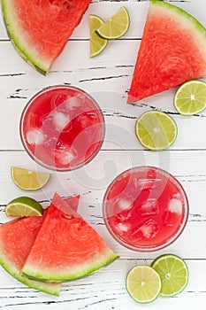 Watermelon margaritas - mexican style summer watermelon alcohol cocktail with lime. Cinco de Mayo drink recipe.