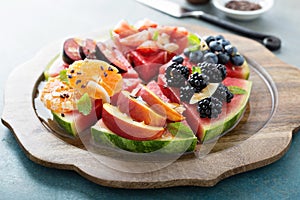 Watermelon pizza with various fruts