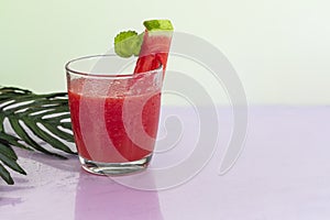 Watermelon pulp smoothie. Delicious red sliced watermelon on a plate. Stock of fiber and fructose. Summer food concept