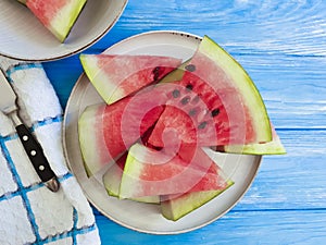 Watermelon ripe, nutritious healthy towel freshness sweet summertime on a blue wooden background