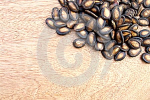 Watermelon seed on wooden background