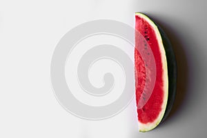 Watermelon slice on a white background, sweet summer foods