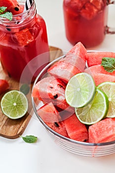 Watermelon slices with lime and smoothie