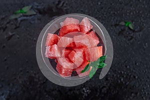 Watermelon slices with mint leaves