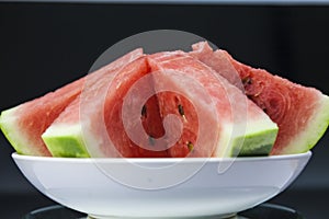 watermelon slices on white plate