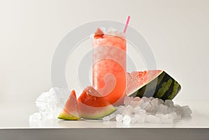 Watermelon slushie with fruit and ice and isolated background